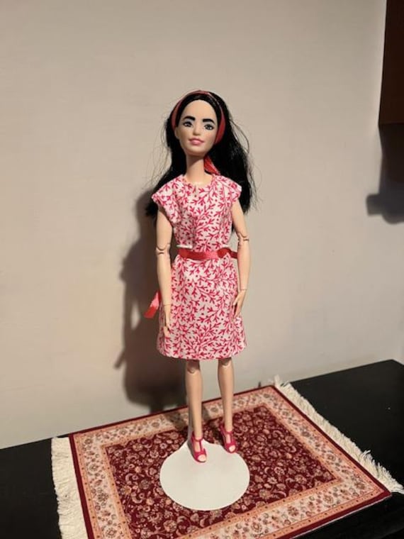 barbie fashionista white dress red pink flowers Fashion Fever Modern Trends Doll in Floral Top & Skirt K9810 complementing her overall appearance Pink and White Summer Dress