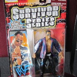 1999 WWF The Rock action figure, M.O.C. Surviror Series