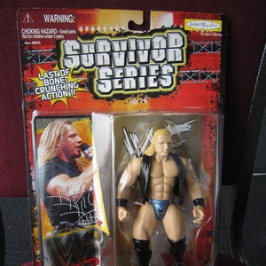 1999 WWF Triple H action figure, M.O.C. Surviror Series