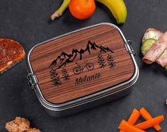 Personalized lunch box made of stainless steel with wooden lid as cutting board