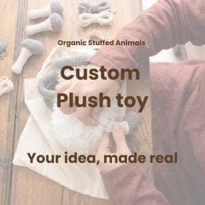 May include: A custom plush toy being assembled with white fuzzy material and grey crocheted parts. The image includes the text: Organic Stuffed Animals, Custom Plush toy, Your idea, made real. Several small grey and white crocheted pieces are visible.