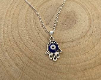 Hamsa hand/hand of Fatima with evil eye blue