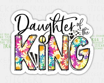May include: A colorful sticker with the text "Daughter of the King" in a bold, handwritten font. The letters are decorated with a floral pattern of daisies in various shades of pink, purple, yellow, and blue.