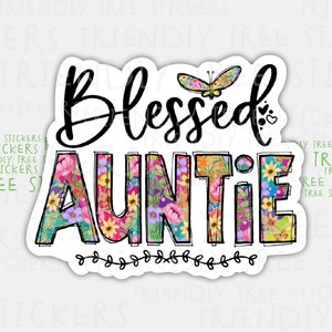 May include: A sticker with a floral design and the text "Blessed Auntie" in black lettering. A small butterfly is above the text.