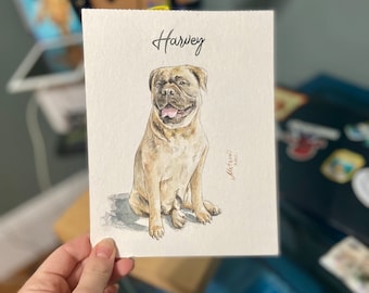 May include: A watercolor painting of a brown dog named Harvey. The dog is sitting with its tongue out and looking to the right. The painting is signed "Mattrovi" and dated "2022".