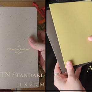 May include: A light beige speckled notebook labelled TN Standard 11 x 21cm with the text OffLeatherAndLeaf, alongside a yellow and dark grey notebook labelled A5. The notebooks are rectangular with clean edges and visible branding text.