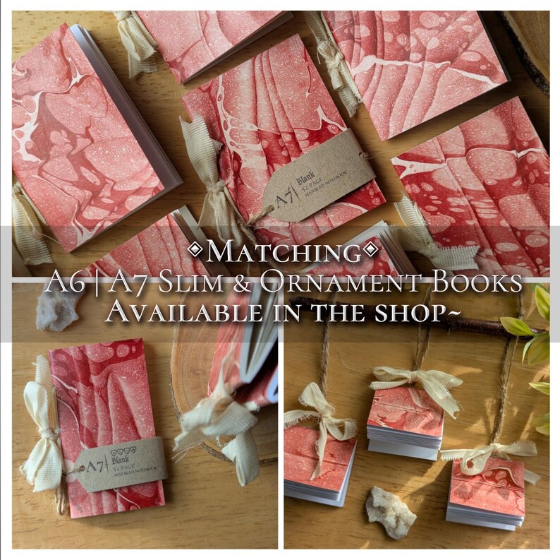May include: A collection of A6 and A7 slim and ornament books with red and white marbled covers. Each book is tied with a cream-colored ribbon and a small tag. The text on the image reads "MATCHING A6 | A7 SLIM & ORNAMENT BOOKS AVAILABLE IN THE SHOP~".