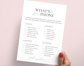 Puede incluir: Un juego de fiesta imprimible con el título "What's on your phone" y una lista de elementos para encontrar en un teléfono, con puntos asignados a cada elemento. El juego incluye categorías como "1 punto", "5 puntos", "10 puntos" y "20 puntos".
