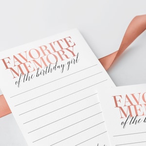 Peut inclure: Une carte blanche avec le texte "FAVORITE MEMORY of the birthday girl" imprim&eacute; en or rose. La carte comporte des lignes pour &eacute;crire.