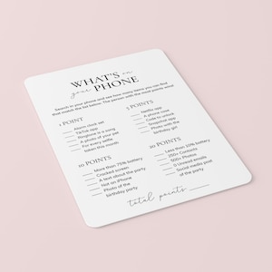 May include: A white printable game card with black text that says "What's on your phone?" and lists items to find on a phone for points. The items include things like a selfie taken this month, a cracked screen, and a photo of the birthday girl.