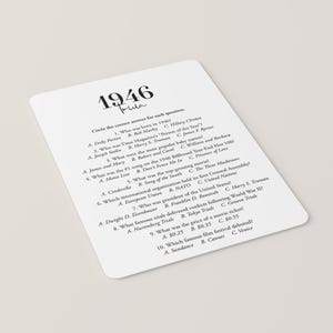 May include: A white trivia card with rounded corners, featuring the year "1946" in large, bold text. The card includes trivia questions about the year, with multiple-choice answers. The word "Trivia" is written in cursive below the year.