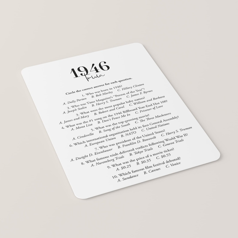 May include: A white trivia card with rounded corners, featuring the year "1946" in large, bold text. The card includes trivia questions about the year, with multiple-choice answers. The word "Trivia" is written in cursive below the year.