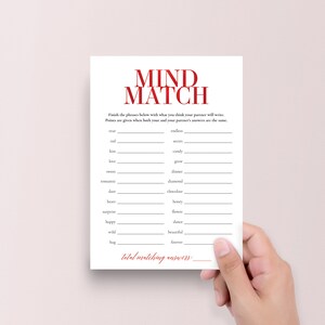 Peut inclure: Une carte de jeu imprimable avec le titre "Mind Match" en texte rouge. Les instructions du jeu sont de terminer les phrases ci-dessous avec ce que vous pensez que votre partenaire &eacute;crira. Des points sont attribu&eacute;s lorsque vos r&eacute;ponses et celles de votre partenaire sont les m&ecirc;mes. Le jeu comprend des phrases comme "vrai amour", "roses rouges", "doux r&ecirc;ves" et "pour toujours &agrave; toi".