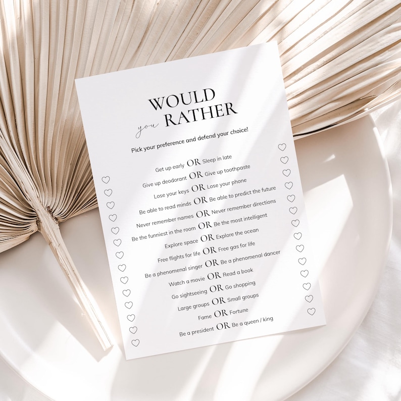 May include: A printable "Would You Rather" game with a white background and black text. The game features a series of questions with two options for players to choose from.  The questions are lighthearted and fun, such as "Get up early or sleep in late?" and "Be a phenomenal singer or be a phenomenal dancer?"