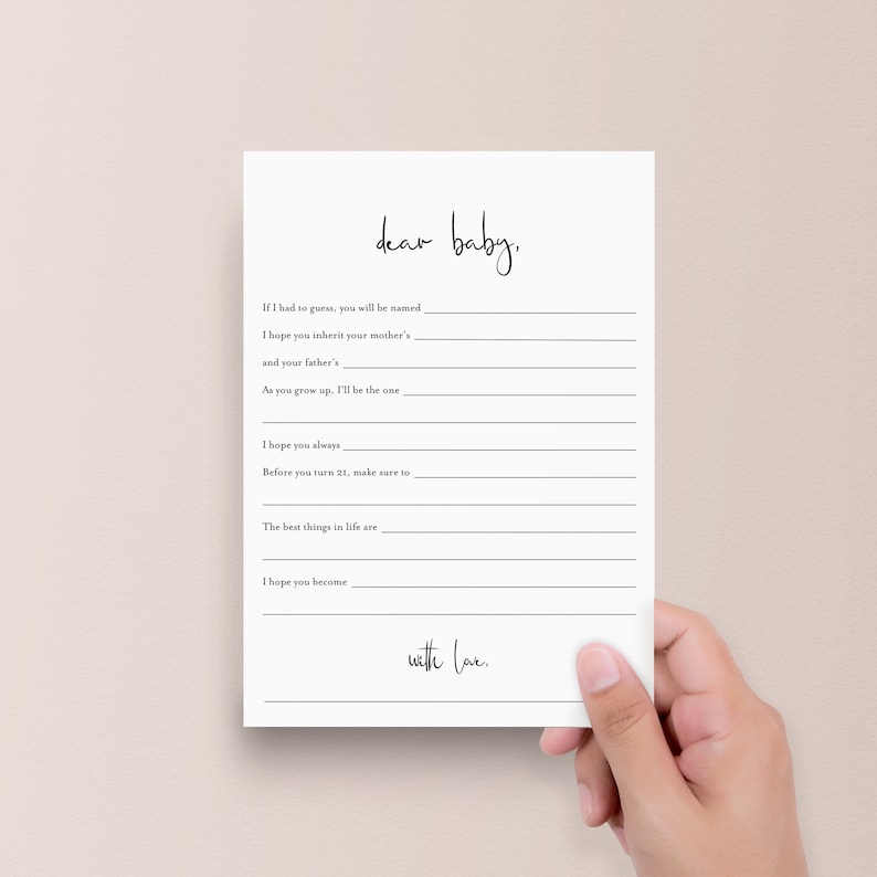 K&ouml;nnte beinhalten: Eine wei&szlig;e Karte mit schwarzem Text, der "Liebes Baby" lautet. Die Karte hat leere Zeilen zum Schreiben eines Briefes an ein Baby. Der Text "mit Liebe" steht am unteren Rand der Karte.