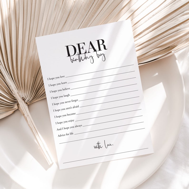 May include: A printable card with the text "DEAR birthday boy" at the top. The card has blank lines for writing advice for a birthday boy. The text "with love." is at the bottom of the card.