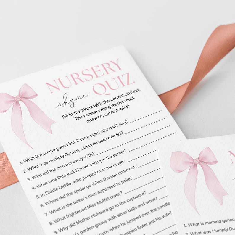 May include: A pink and white printable nursery rhyme quiz game with a pink watercolor bow on the top. The quiz asks questions about popular nursery rhymes like Humpty Dumpty, Little Jack Horner, and Miss Muffet.