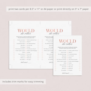 May include: Two printable "Would She Rather" game cards with pink hearts and text. The cards feature a list of questions to help you get to know someone better. The text on the cards reads "Would She Rather".