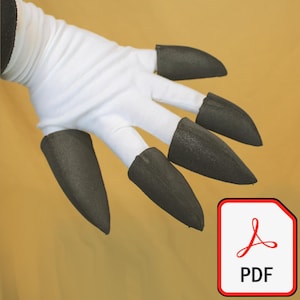 Può includere: Mano in tessuto bianco con copridita neri a forma di artiglio. La mano è contro uno sfondo giallo. Un'icona PDF si trova nell'angolo in basso a destra.