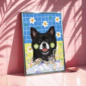 May include: A framed print of a black dog with cucumber slices on its eyes, surrounded by bubbles. The background is a blue grid with daisy and clover illustrations. The artwork is in a silver frame, set against a pink tiled wall.