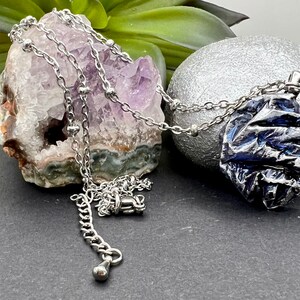 Handmade resin pendant on stainless steel satellite chain