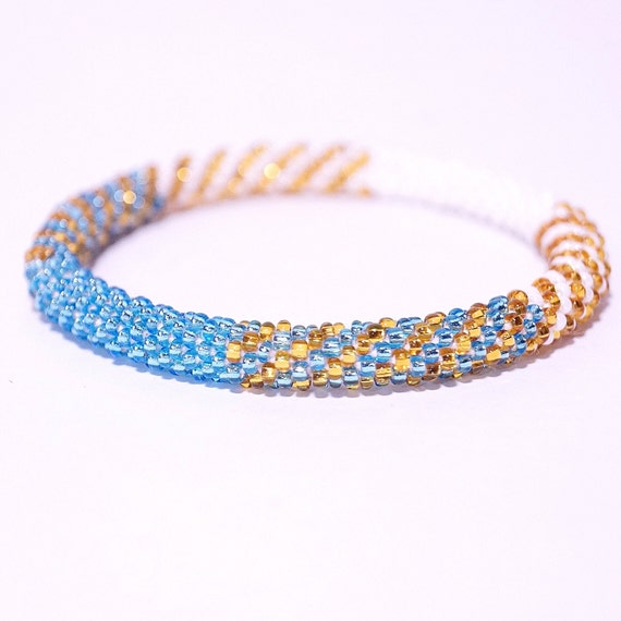 Handcrafted Glass Bead Bracelet: Blue & Gold Nepali Jewelry