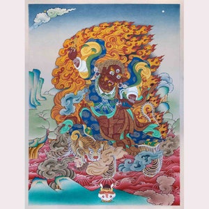 May include: A colorful Tibetan Buddhist painting depicting a deity with multiple eyes and a fierce expression, seated on a tiger. The deity is surrounded by flames and clouds, and the background is a blue sky with a white star.