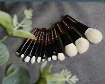 Top level goat hair sandalwood mini travel size full makeup up brush set with PU leather bag