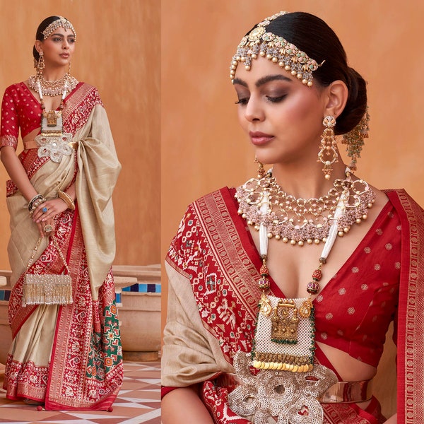 Cream with Red Stunning Patola Saree in Soft Silk with Contrast Blouse and Tessles