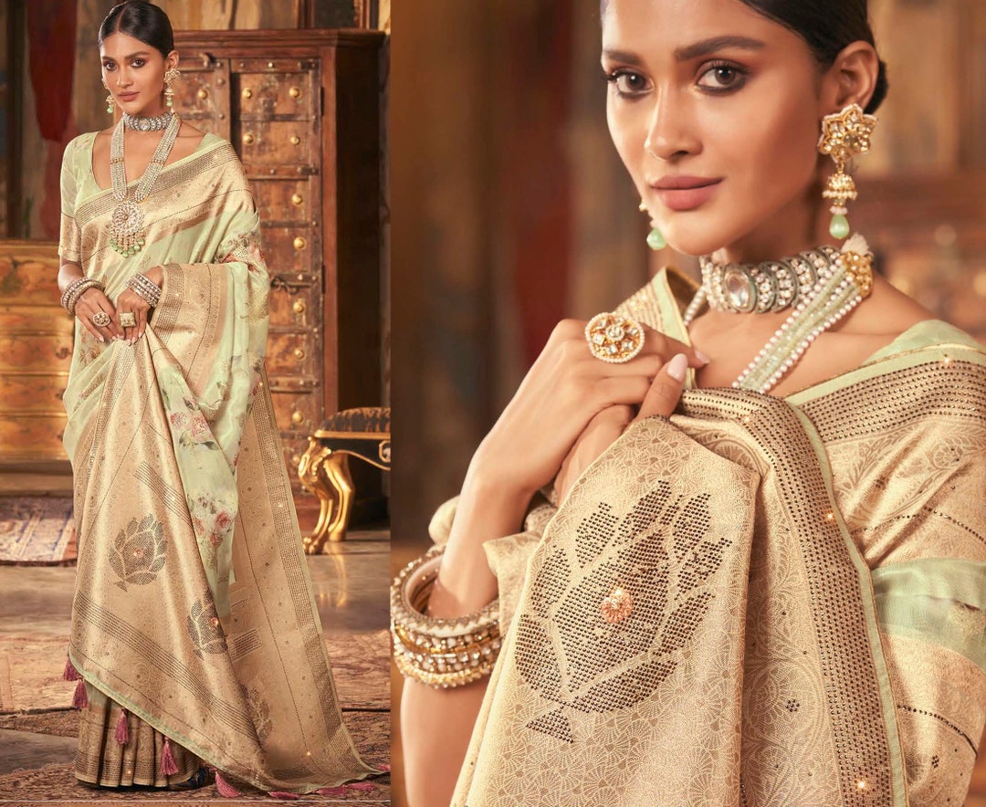 Pastel Green Golden Floral Kanchi Pattu Saree With Embossed Real