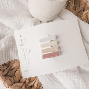 Beige baby hair clips | small ivory toddler hair clips | petite dusty rose baby hair clips | soft white hair clips | baby lined first clips