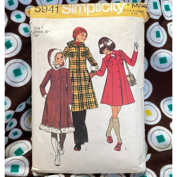 Vintage sewing pattern, Simplicity no 5941, 1973 copyright, fall/winter coat two lengths, size 7 girl, cut