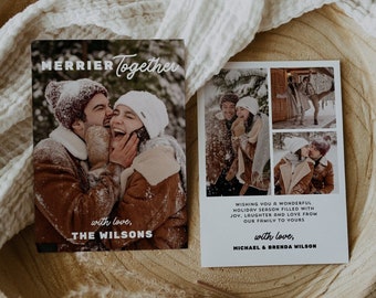 May include: A Christmas card with a photo of a couple in winter clothing. The card reads "MERRIER Together" and "with love, THE WILSONS". The back of the card has a collage of photos of the couple and reads "WISHING YOU A WONDERFUL HOLIDAY SEASON FILLED WITH JOY, LAUGHTER AND LOVE FROM OUR FAMILY TO YOURS with love, MICHAEL & BRENDA WILSON".