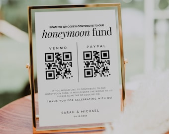 Könnte beinhalten: Ein weißes Schild mit goldenem Rahmen, mit dem Text "SCAN THE QR CODE & CONTRIBUTE TO OUR HONEYMOON FUND" in Schwarz. Das Schild hat zwei QR-Codes, einen für Venmo und einen für PayPal, mit dem Text "VENMO" und "PAYPAL" über jedem QR-Code. Das Schild hat auch den Text "IF YOU WOULD LIKE TO CONTRIBUTE TO OUR HONEYMOON FUND, IT WOULD MEAN THE WORLD TO US! PLEASE SCAN THE QR CODE BELOW." und "THANK YOU FOR CELEBRATING WITH US! SARAH & MICHAEL 06.18.2025".