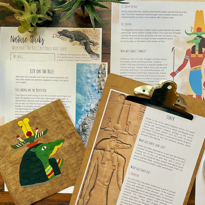 May include: A nature study worksheet about the Nile crocodile and Sobek, the Egyptian god of the Nile. The worksheet includes illustrations of a crocodile and Sobek, along with text about their characteristics and mythology.