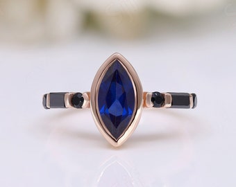 0.3カラット マーキスカット ラボ製サファイア ハロー アニバーサリー