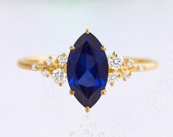 0.3カラット マーキスカット ラボ製サファイア ハロー アニバーサリー