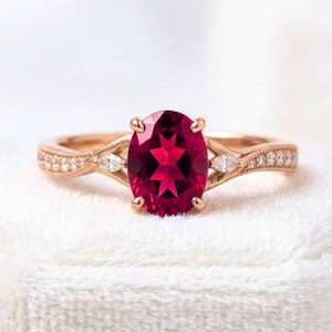 Oval Ruby Ring with Moissanite Accents, 14K Rose Gold Plated Silver Infinity Band, Engagement Ring, July Birthstone