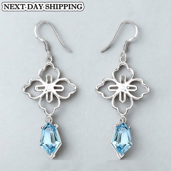 Revoni Illuminating 2.00ct London Blue Topaz Round Cut Earrings in Sterling Silver