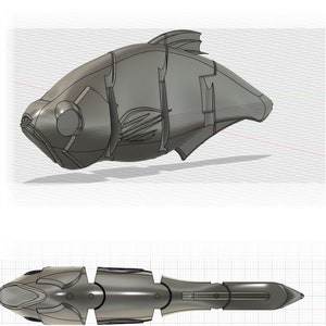 May include: A 3D model of a fish lure, shown from four different angles. The lure is made of metal and has a realistic fish shape.