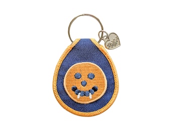 prison pancake keychain