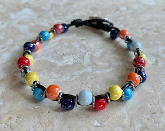 Double Layer Ceramic Beads Strung with Leather and Antique Silver Sand Dollar Button Closure