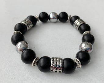 12mm Matte Onyx, Silver Hematite and Stainless Steel Accents Stretch Bracelet.