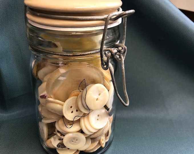 Glass Jar of vintage mother of pearl buttons