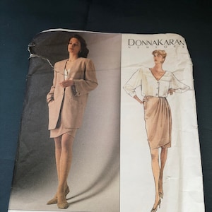 May include: A sewing pattern for a jacket and skirt set by Donna Karan New York. The pattern is for sizes 8-10-12 and is from Vogue Patterns, American Designer.