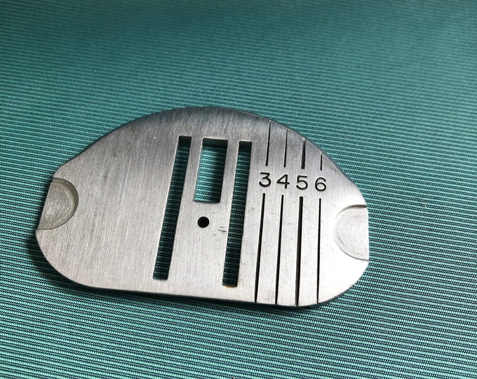 Singer sewing machine touch and sew 600 series needle plate