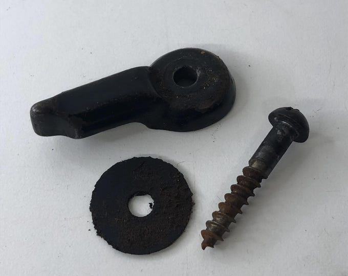 Singer 12K sewing machine bed retention catch