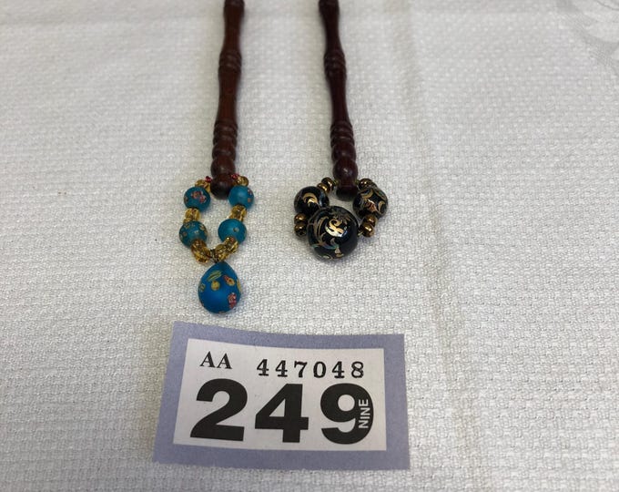 Pair of dark wood lacemaking bobbins