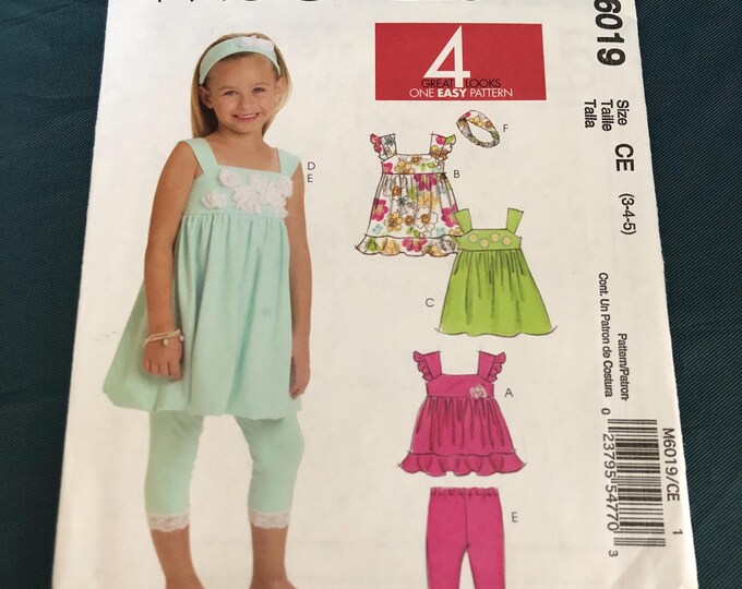 Children's top, dresses, leggings and headband paper Sewing Pattern, Factory Folded, McCalls M6019