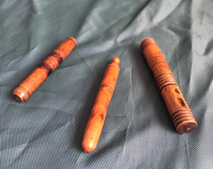 Vintage wooden needle holders